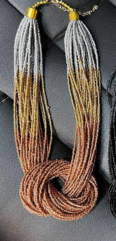 Statement knot necklace- Beige gold