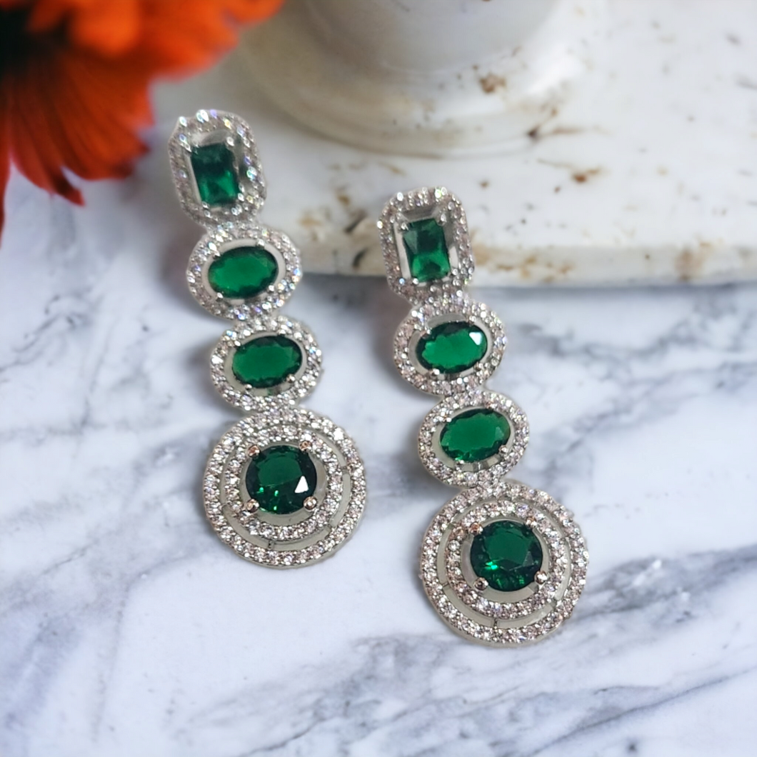 Emerald sapphire halo diamond earrings