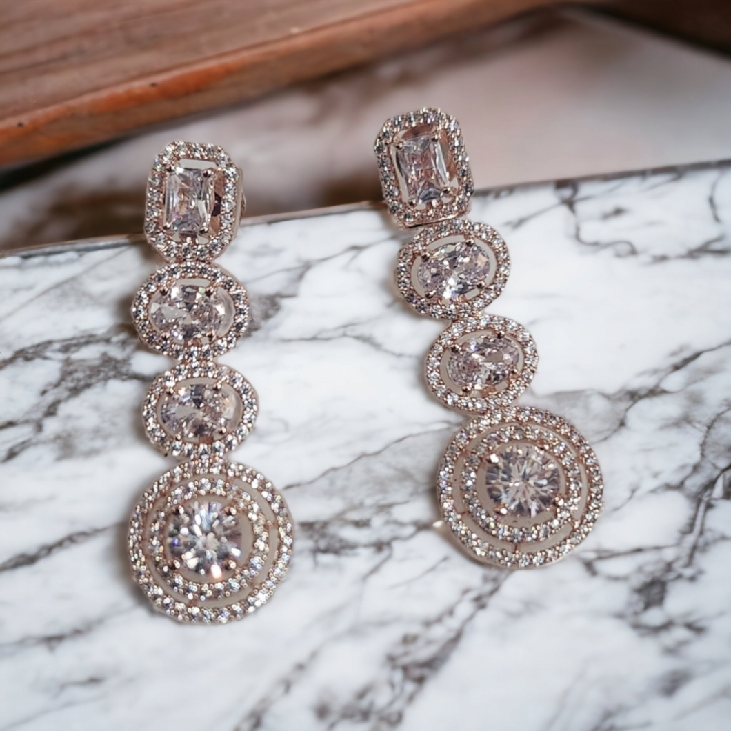 Rose gold halo diamond earrings