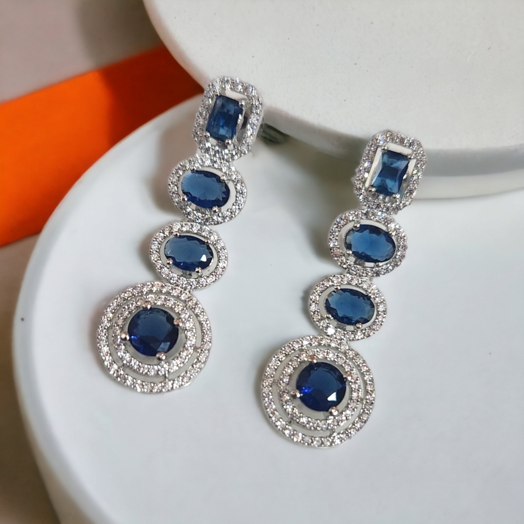 Blue sapphire halo diamond earrings