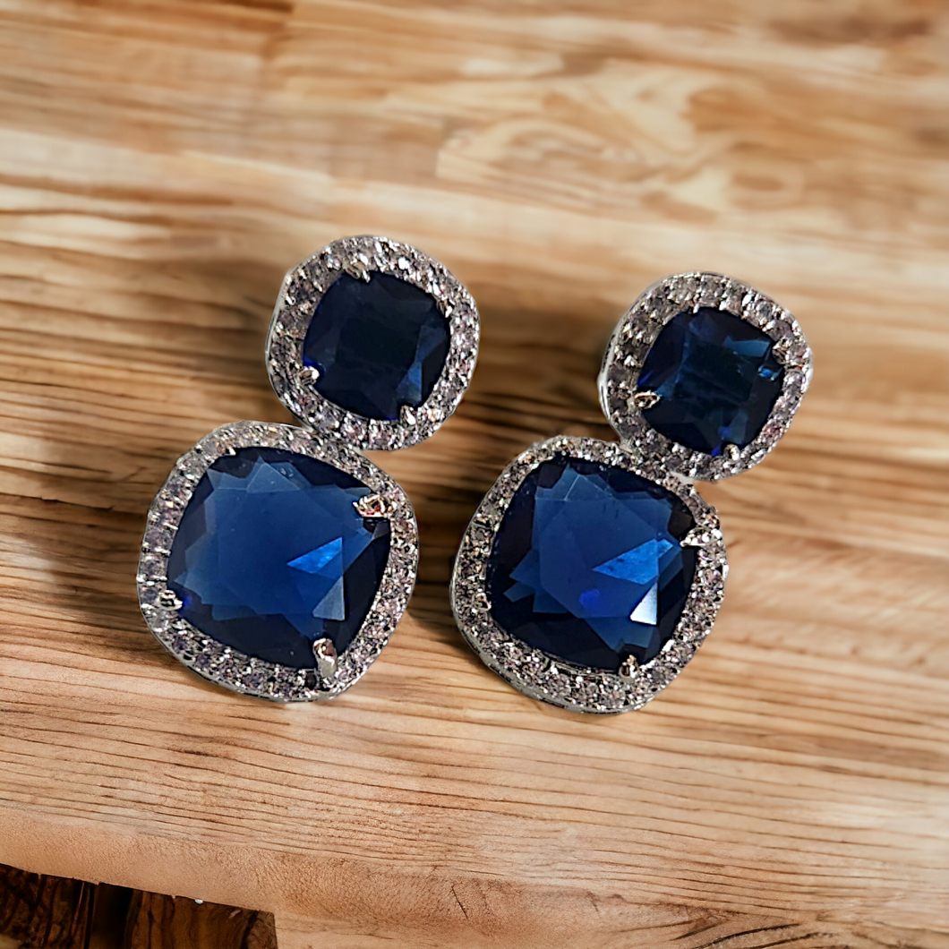 Blue sapphire studded white gold earrings