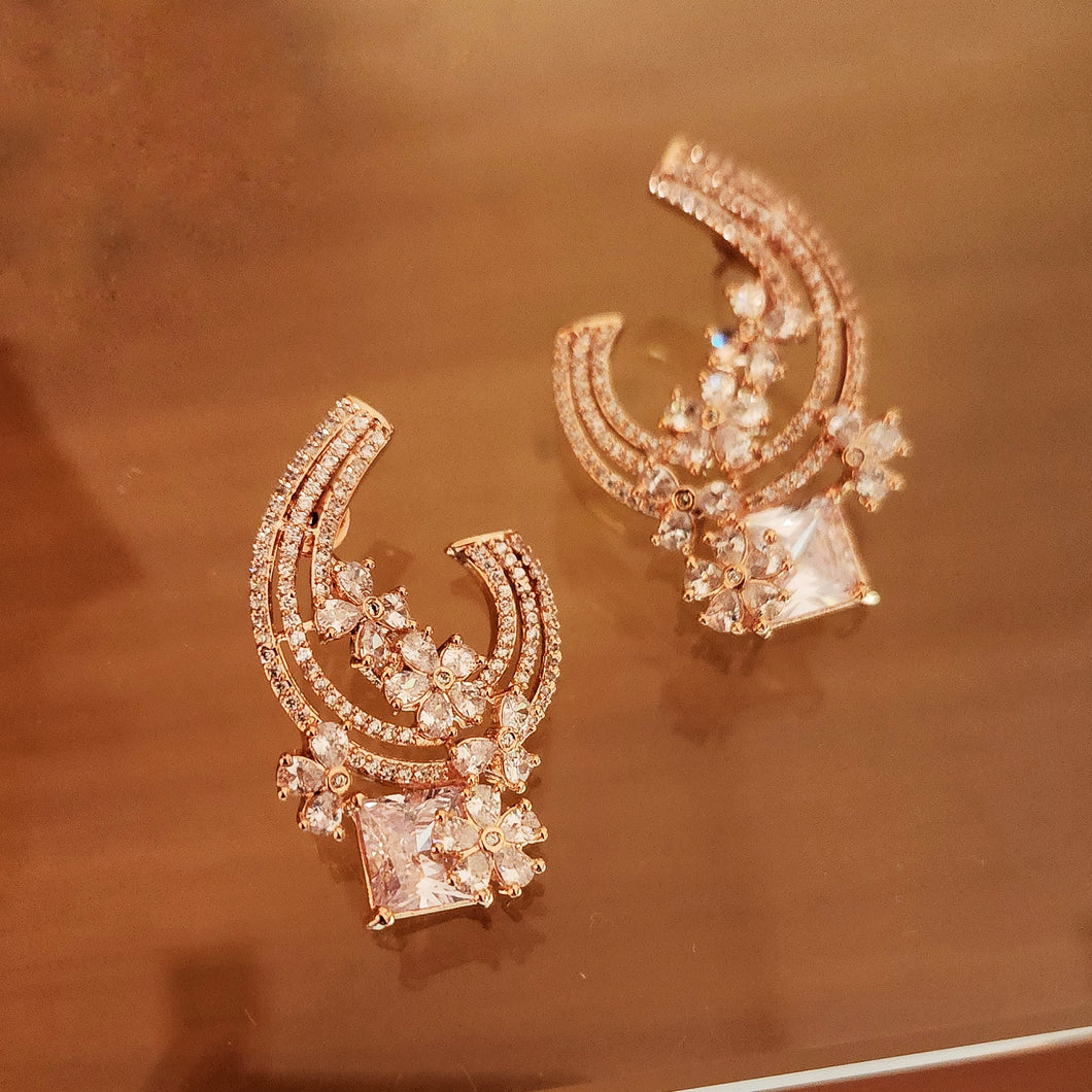 Half moon rose gold diamond earrings