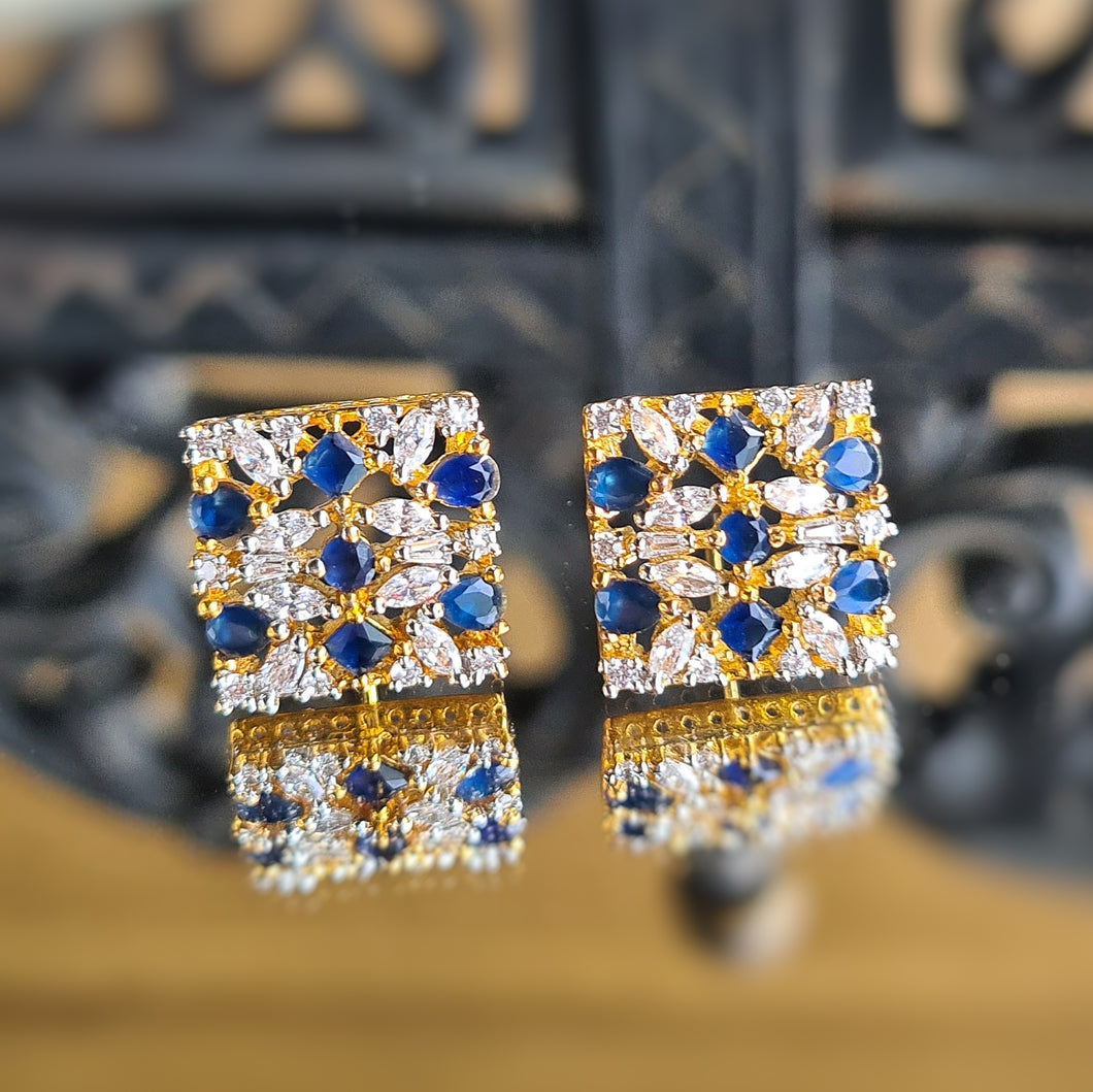 White gold finished statement earrings adorned with diamond and coloured stones