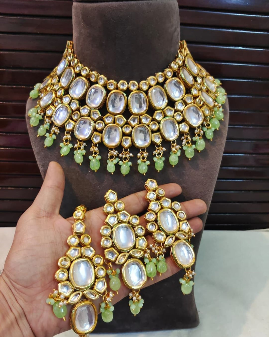 Mint green kundan set with earrings and maangtika