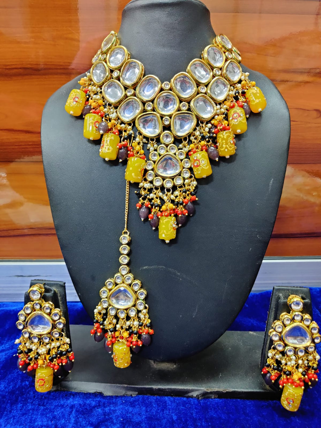 Yellow uncut polki set with earrings and maangtika
